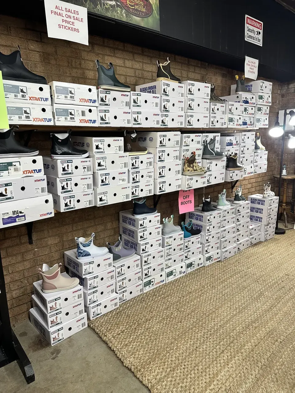 Wall of boot boxes at Cowboy Country Western Wear